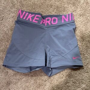 Nike Women's Athletic Shorts in Gray with Pink Accents